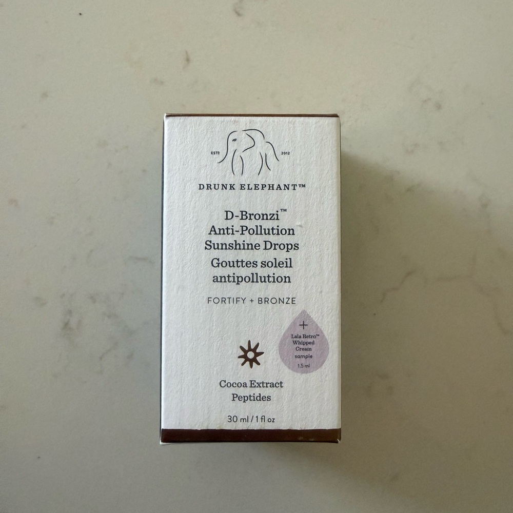Drunk Elephant D-Bronzi Sunshine Drops — White Box with Bronze Accents